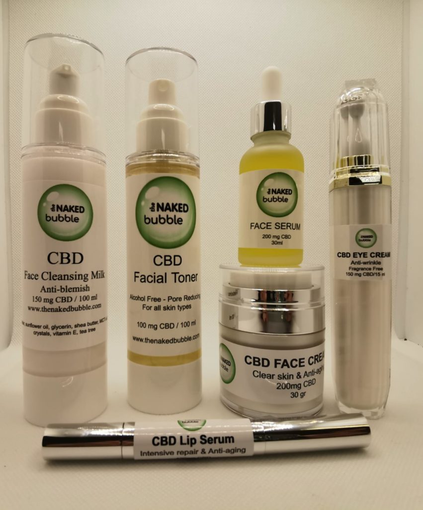 Bottles and containers of CBD skin care products.